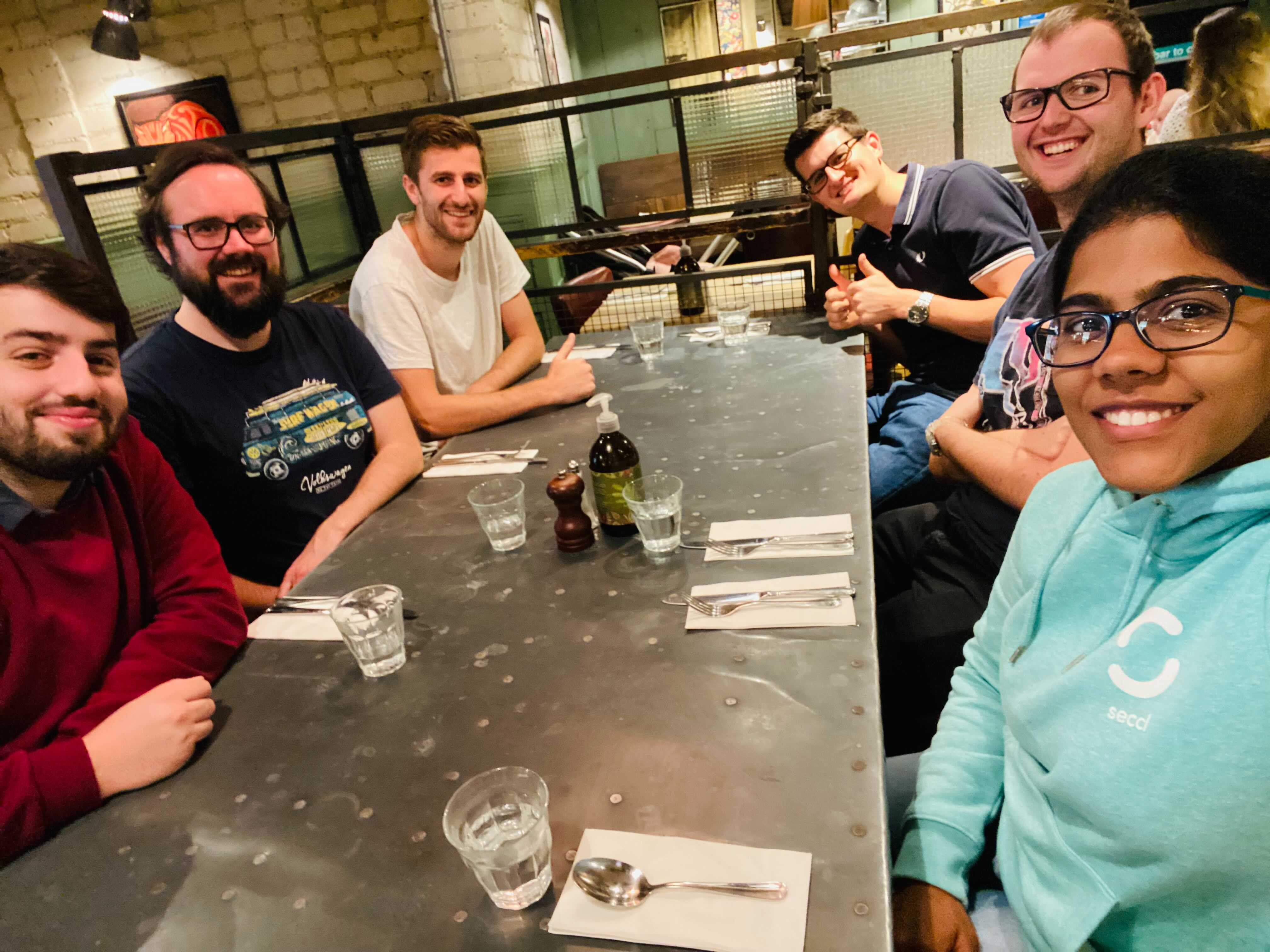 Jon (top left) enjoying lunch with the rest of his squad